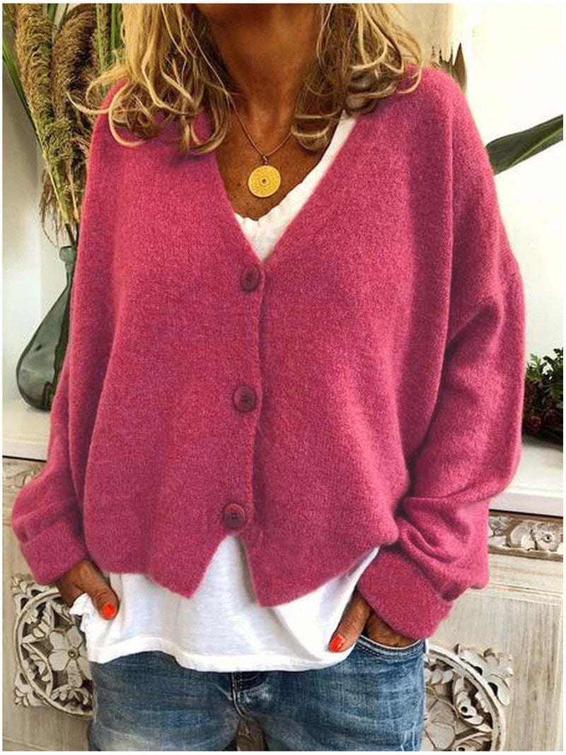Full-length view of model wearing the Shannon knit cardigan in a warm-toned color option