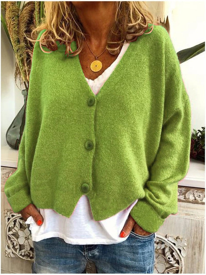 Overhead or styled shot of the Shannon cardigan folded or displayed to show color options
