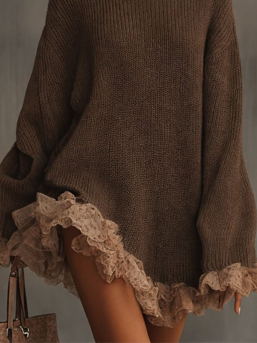 Close-up detail of the romantic ruffles on the brown Shannon knit dress