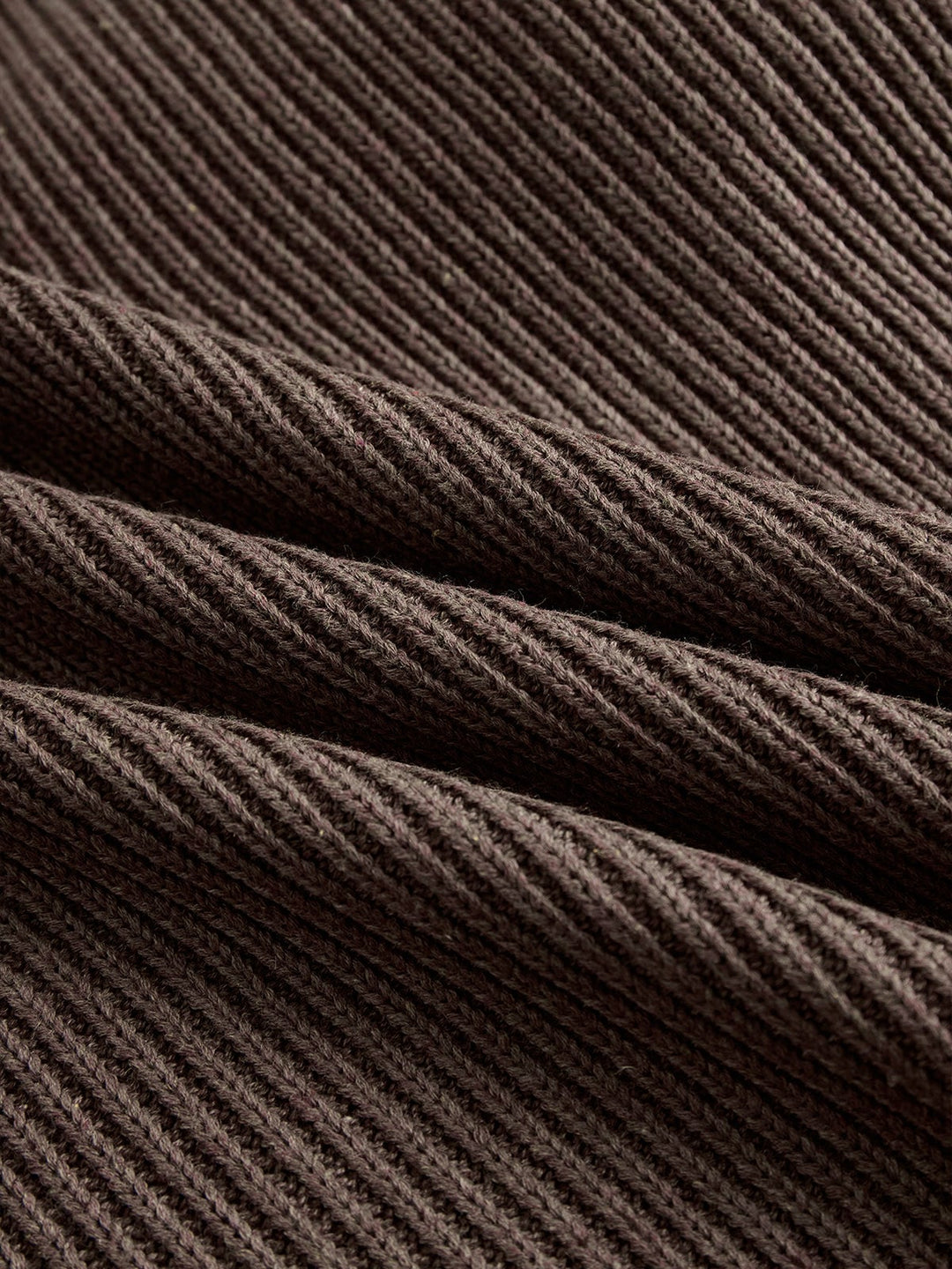 Full-length side view of the Shannon ruffled dress in brown highlighting the flattering stretchy fit