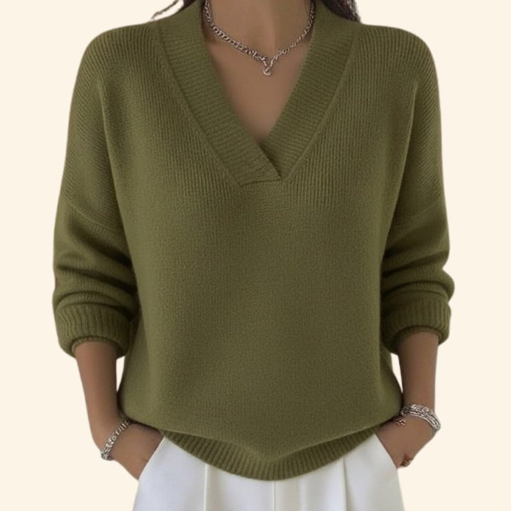 Full-length view of a woman in the Shayla V-neck blouse styled with casual bottoms