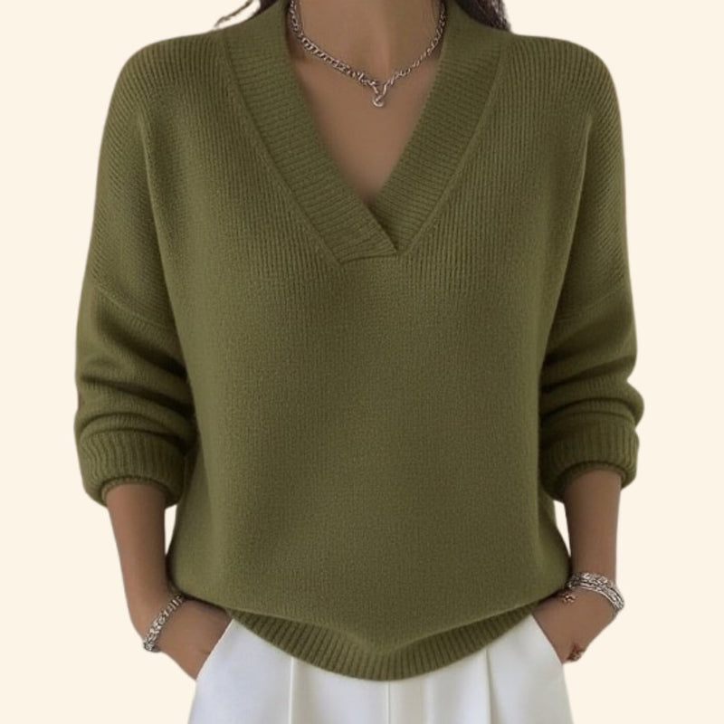 Full-length view of a woman in the Shayla V-neck blouse styled with casual bottoms