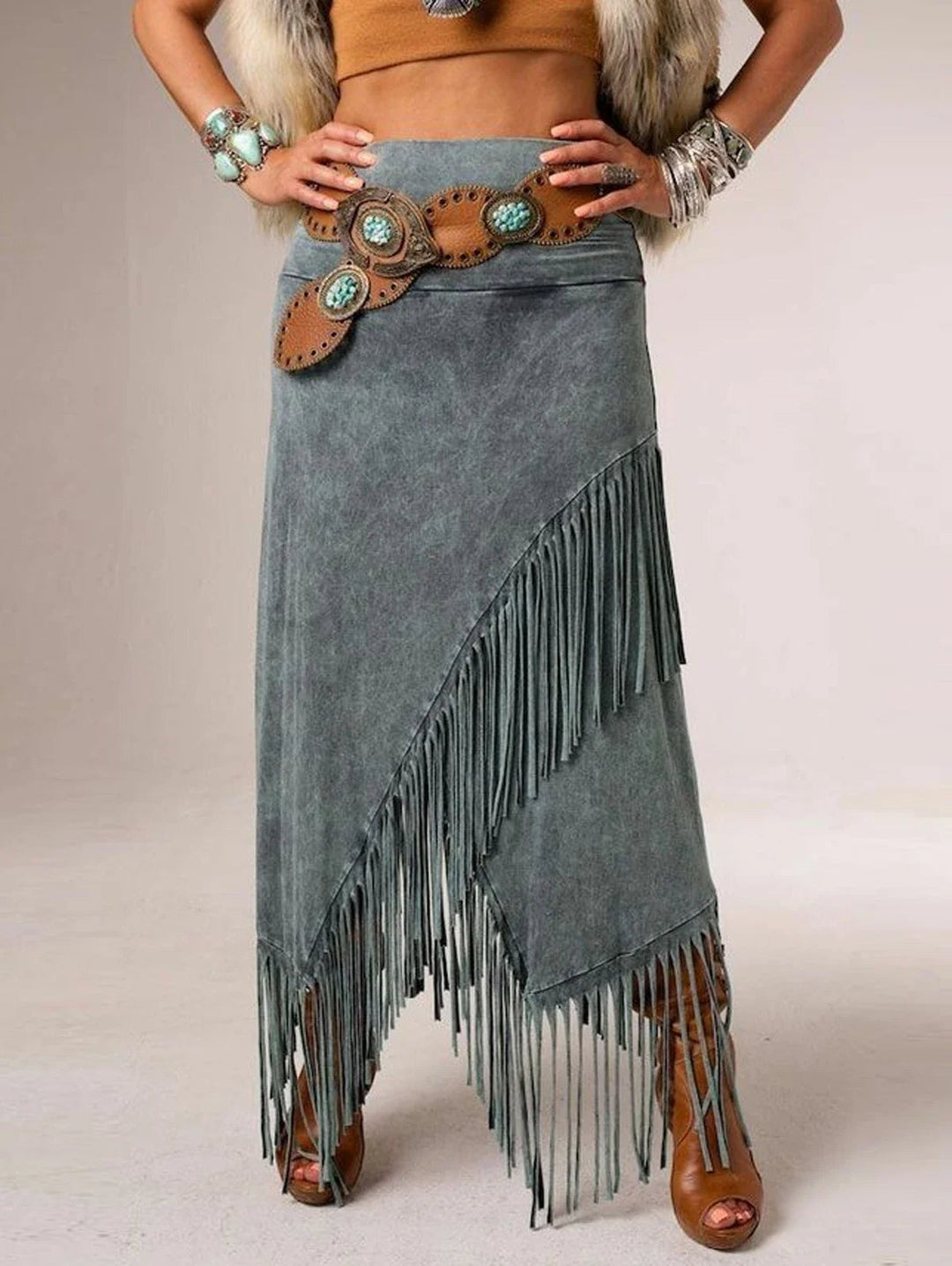 Gray A-line maxi fringe skirt with high waist and tassel detailing, front view on model