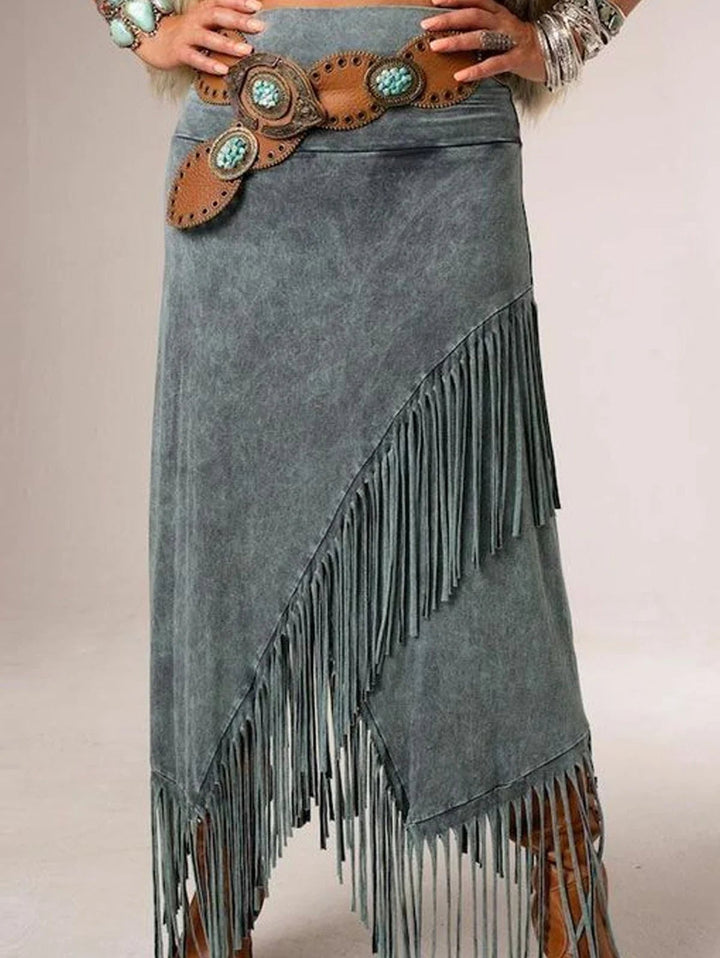 Close-up of gray maxi fringe skirt showing bohemian tassel embellishments and flowing silhouette