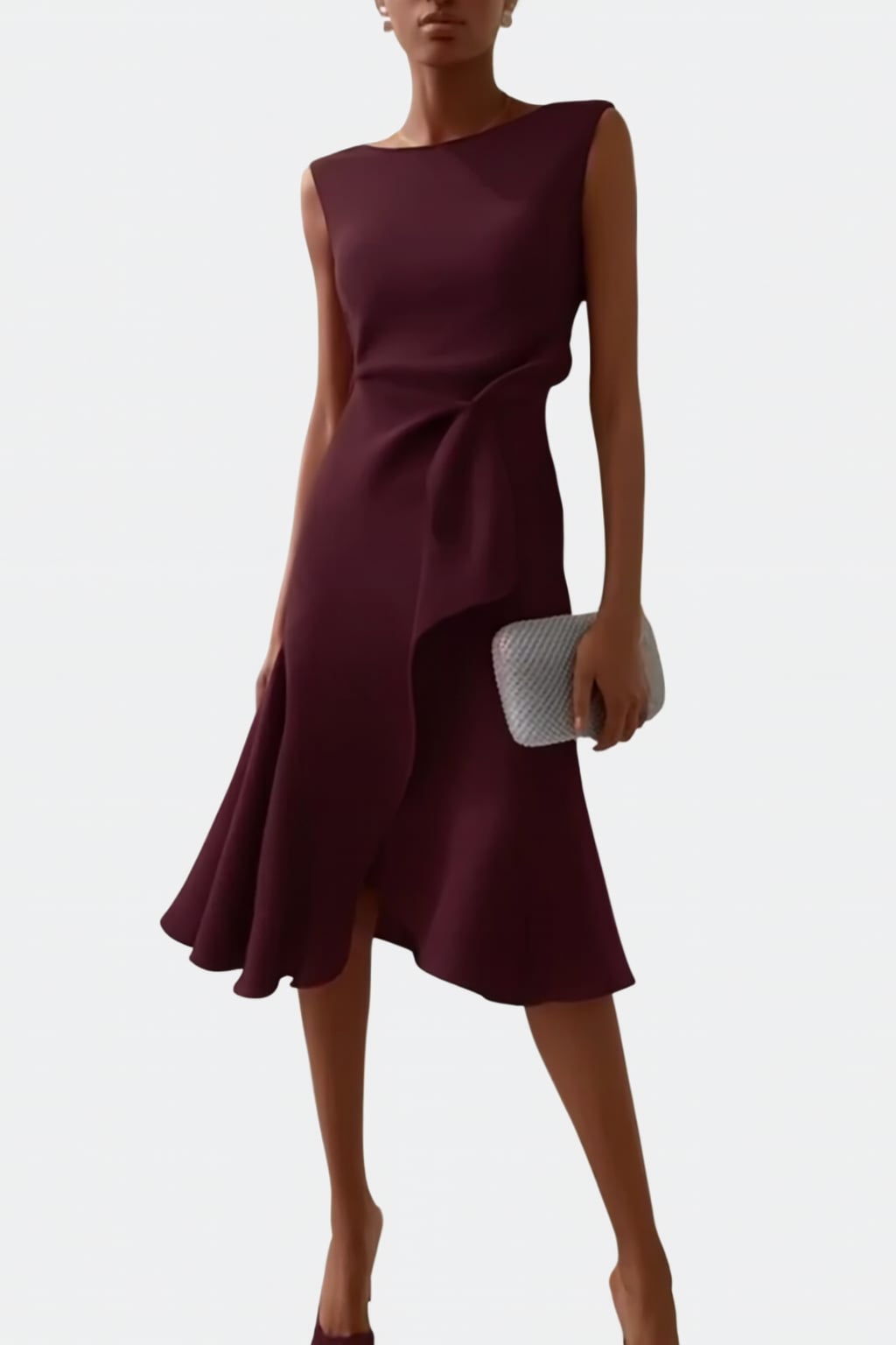 Draped asymmetric midi dress styled with heeled sandals for a wedding guest look