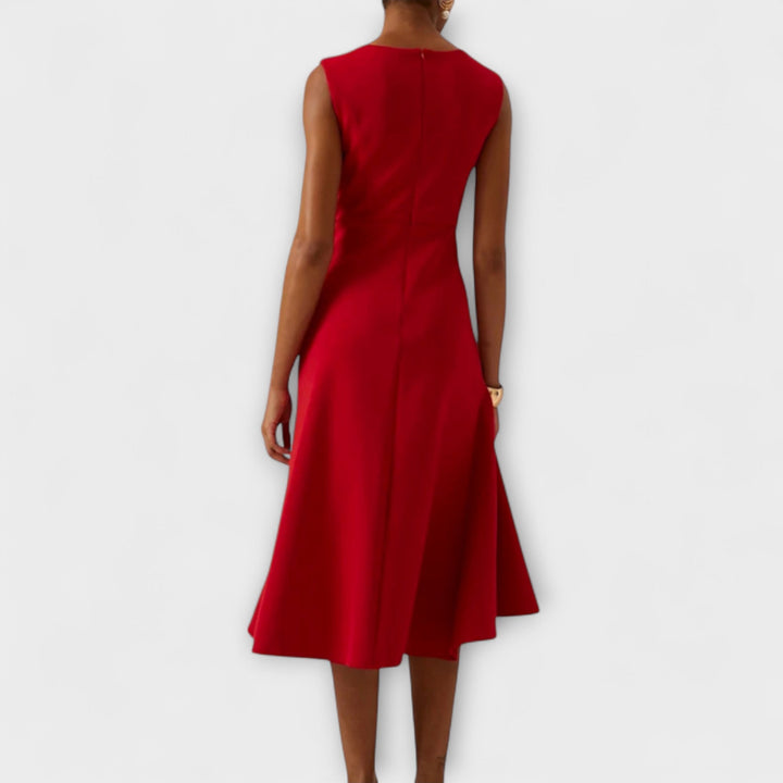 Model wearing the midi dress outdoors, highlighting the flattering sleeveless design