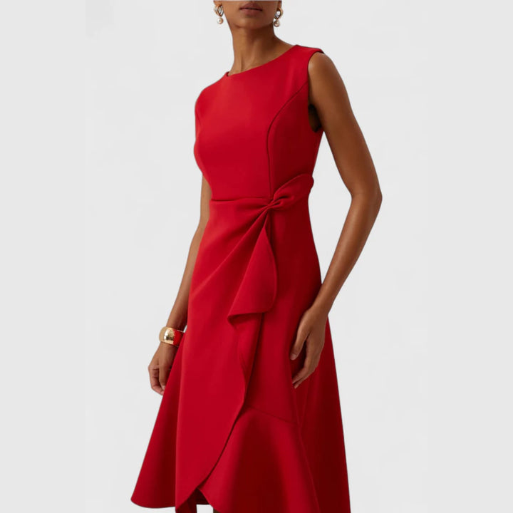 Color variant of the draped asymmetric midi dress laid flat showing shape and length