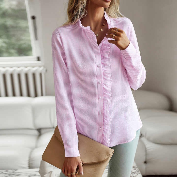 Detail shot of the flowing sleeve and pleat construction on the Sheri long-sleeve blouse