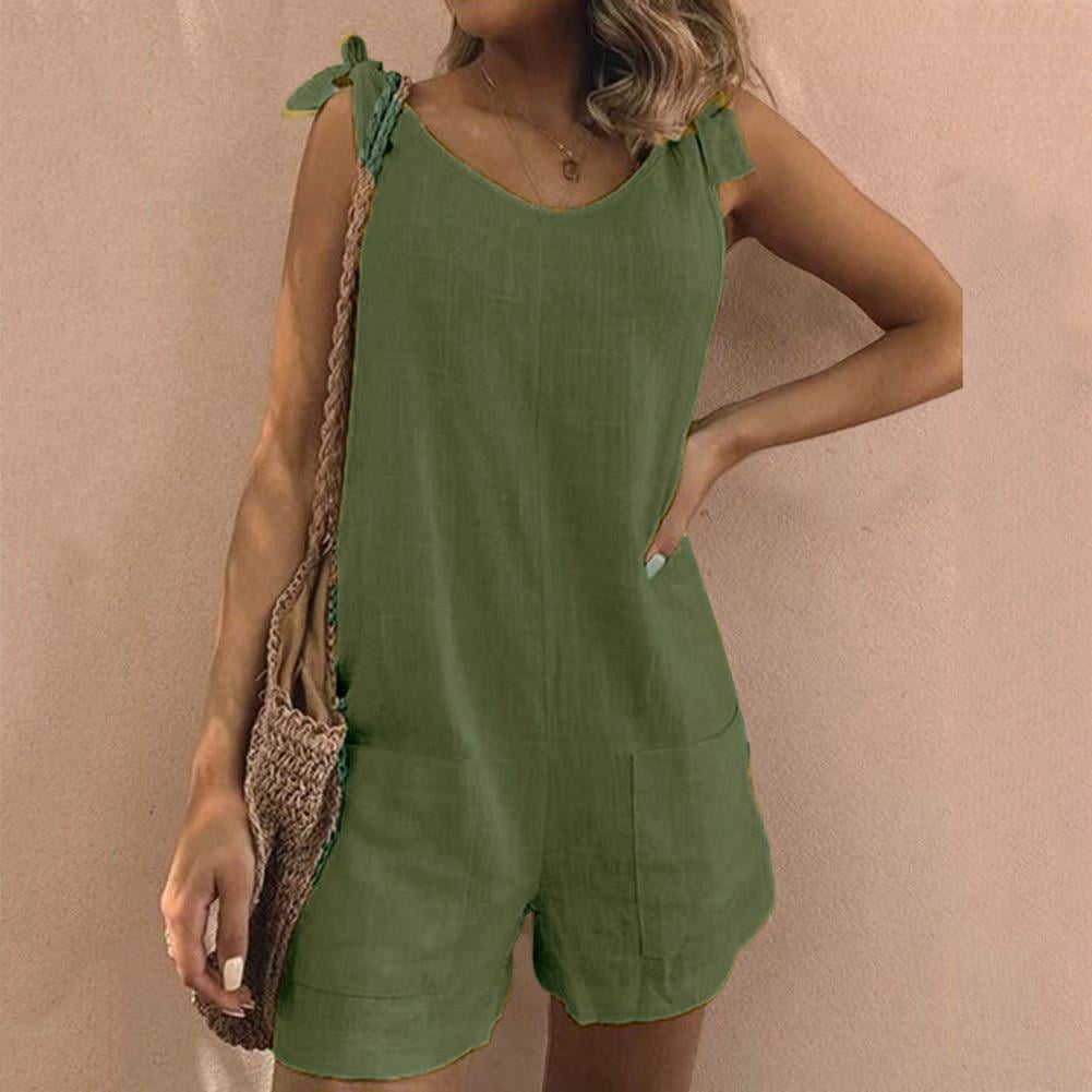 Flat lay of the bow strap playsuit displayed in multiple available colors on a clean background