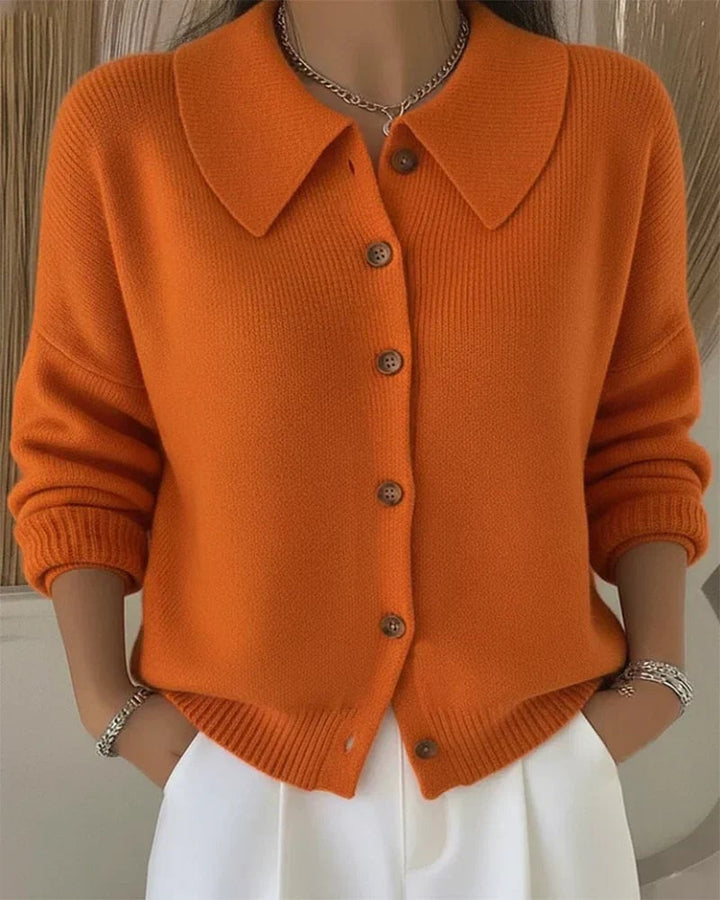 Button collar cardigan draped over shoulders showing flattering relaxed silhouette