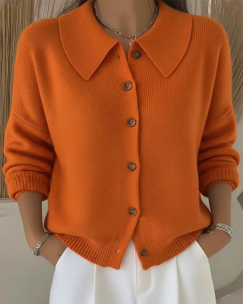 Button collar cardigan draped over shoulders showing flattering relaxed silhouette