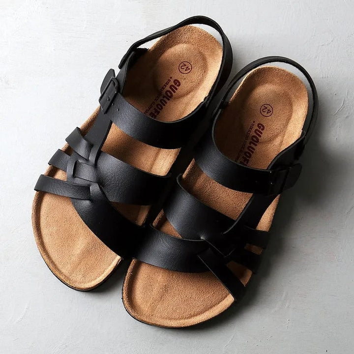 Sienna women's flat sandals in black with secure straps and cushioned footbed, front view