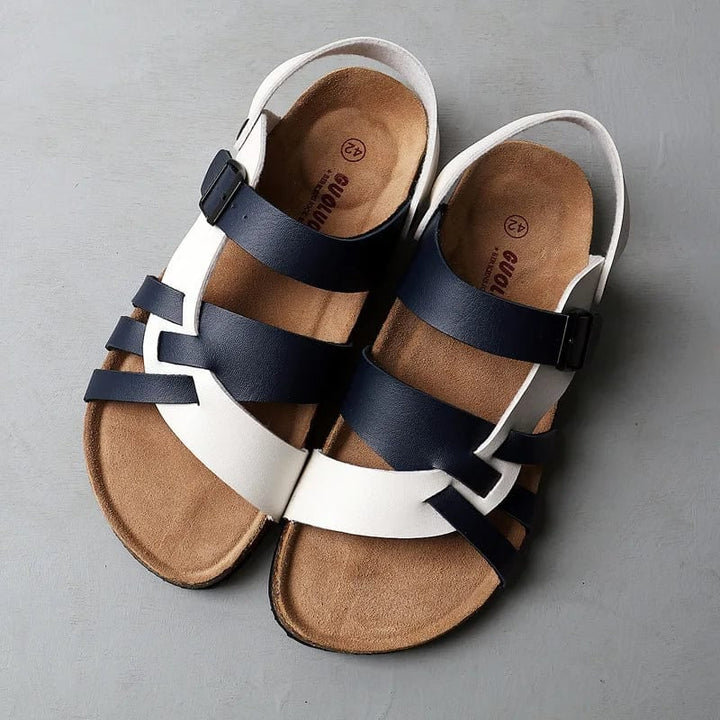 Close-up of the Sienna sandal strap and cushioned sole detail in black