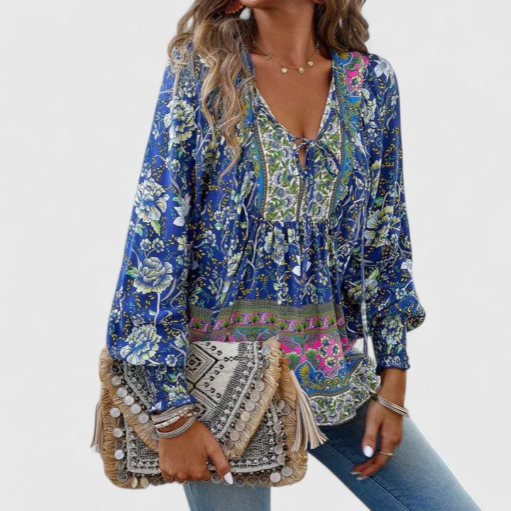 Close-up of the lace-up V-neck tie detail on the Sienna floral boho blouse in pink
