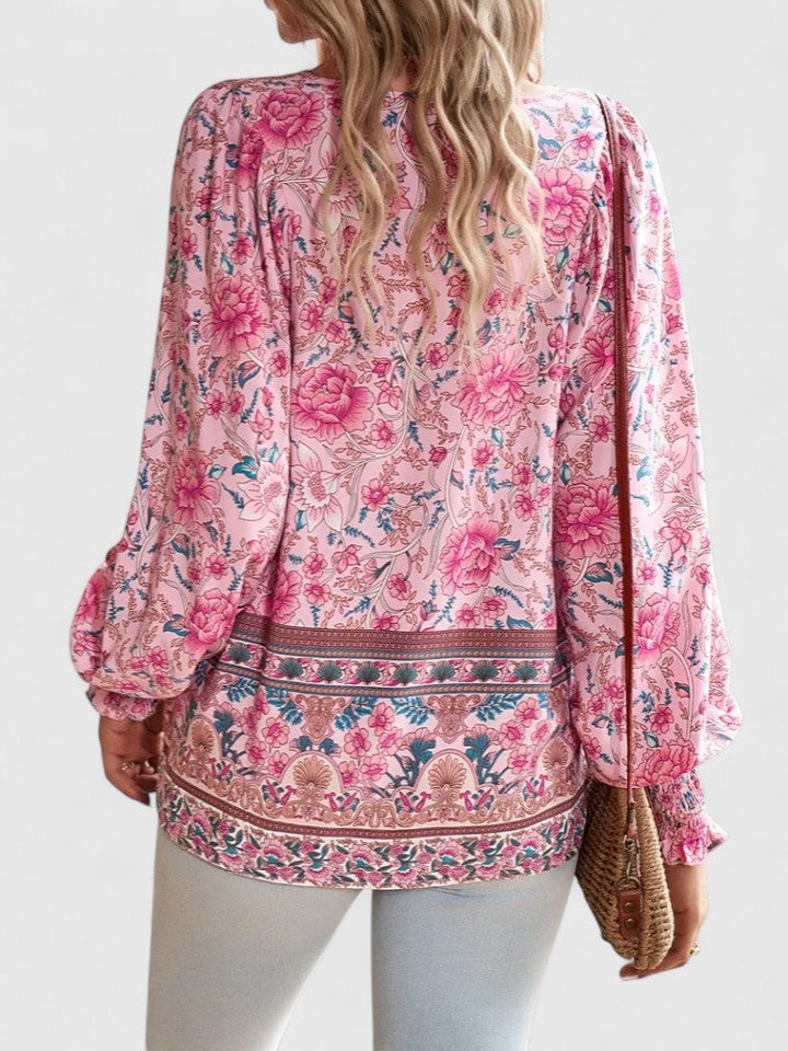 Size chart detail for the Sienna floral boho blouse showing measurements for S through XL