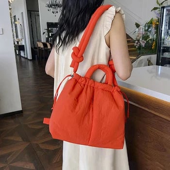 Sienna quilted puffer tote bag in Beige displayed on a neutral background