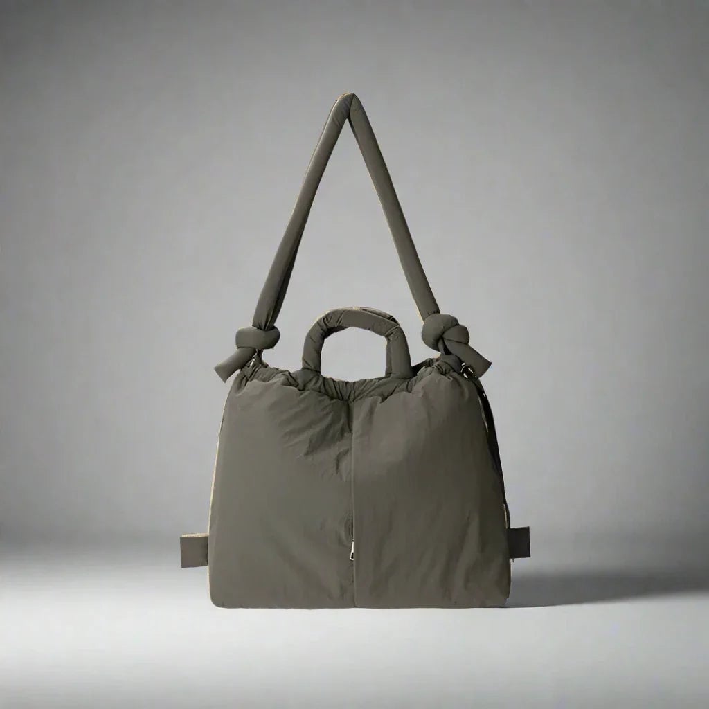 Sienna quilted puffer tote bag handle detail showing padded strap