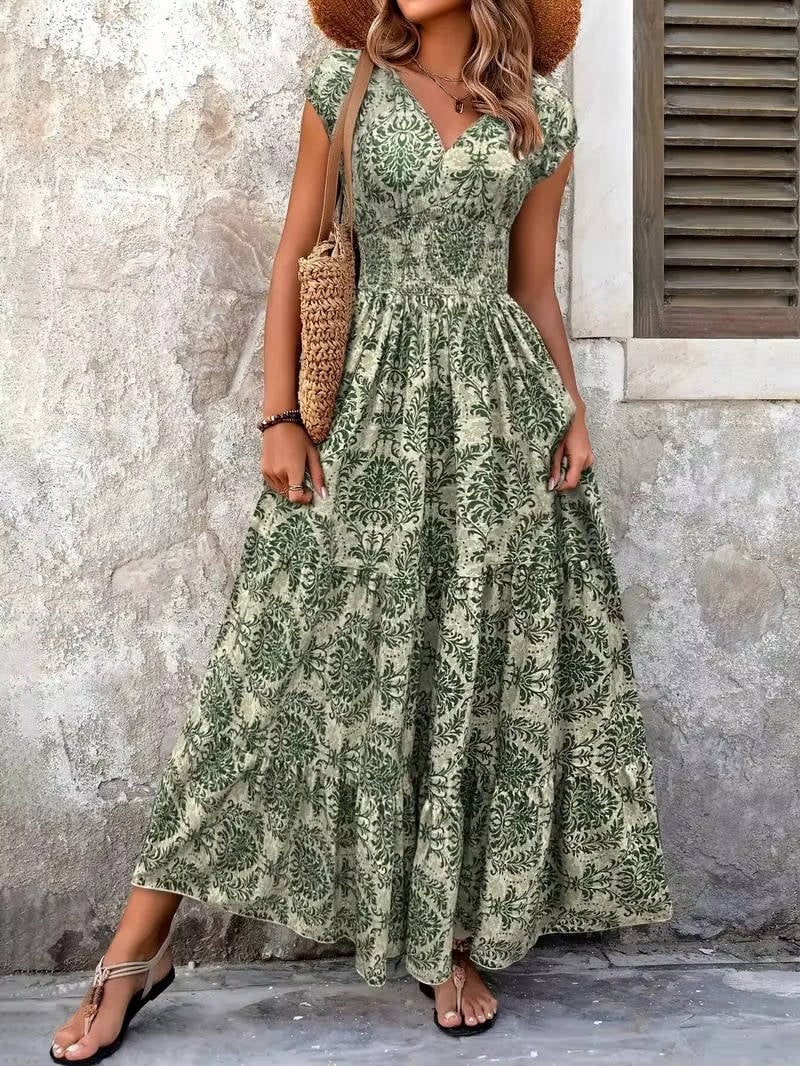 Front view of the Sienna maxi dress showing the V-neckline and smocked elastic waist detail
