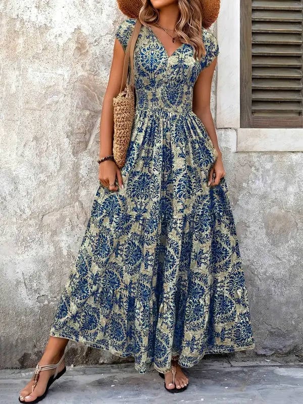Side view of the Sienna tiered maxi dress highlighting the flowing A-line skirt silhouette