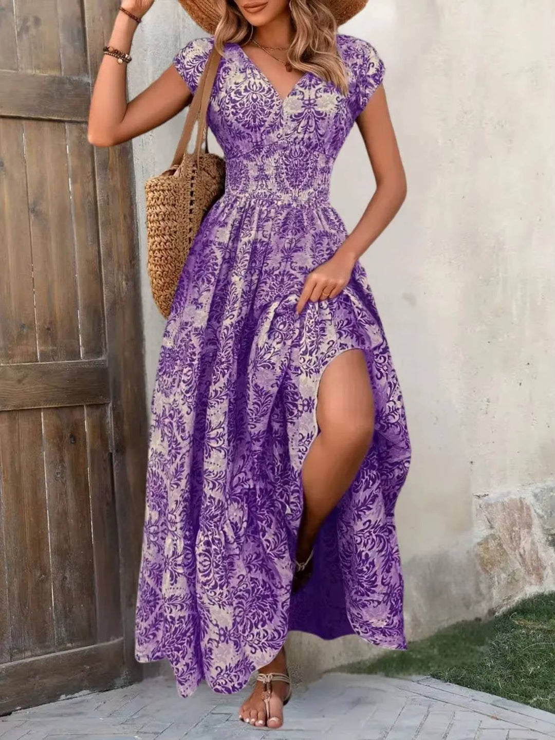Close-up of the smocked waist and boho print fabric on the Sienna maxi dress