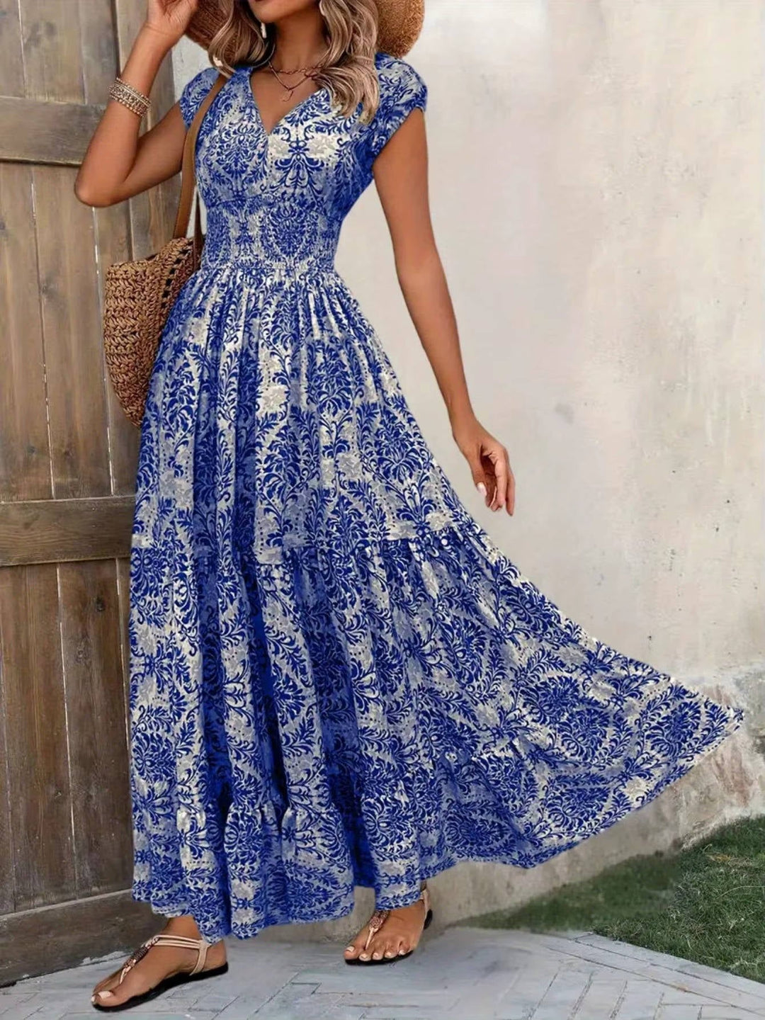 Woman in the Sienna maxi dress styled with sandals for a casual outdoor look