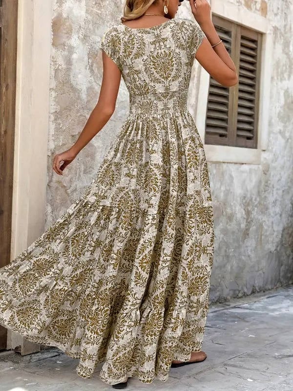 Detail shot of the cap sleeves and V-neckline on the Sienna boho maxi dress