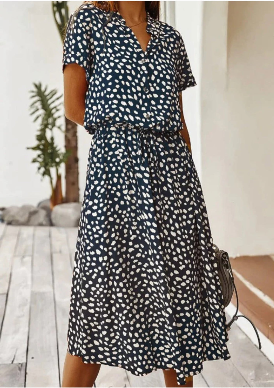 Women's dalmatian-spot midi dress in khaki with flutter sleeves, full-length front view