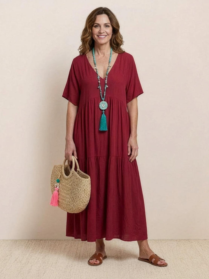Sienna tiered maxi dress in army green shown from the front with short sleeves