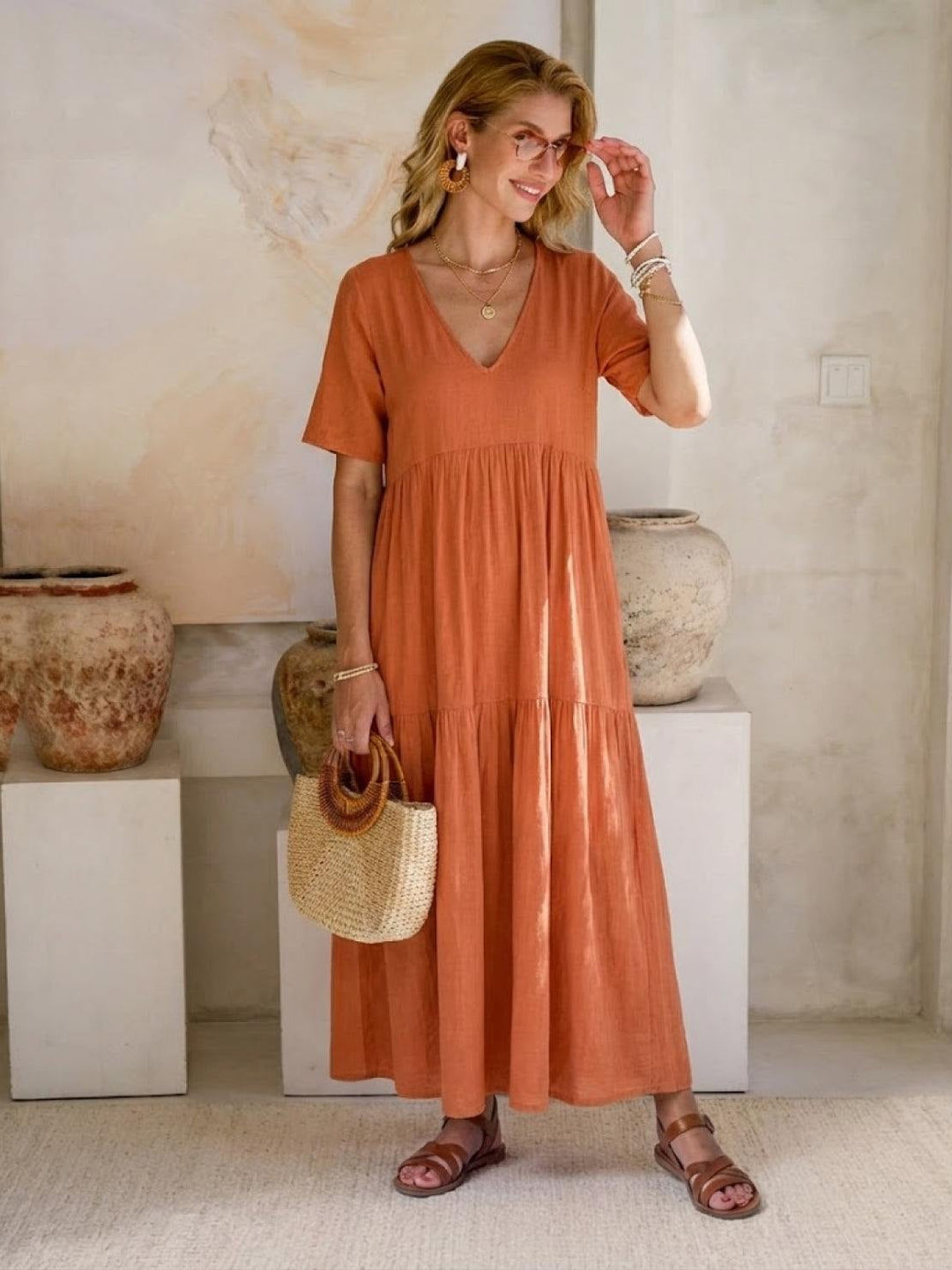 Side profile of Sienna swing dress in army green showing maxi length