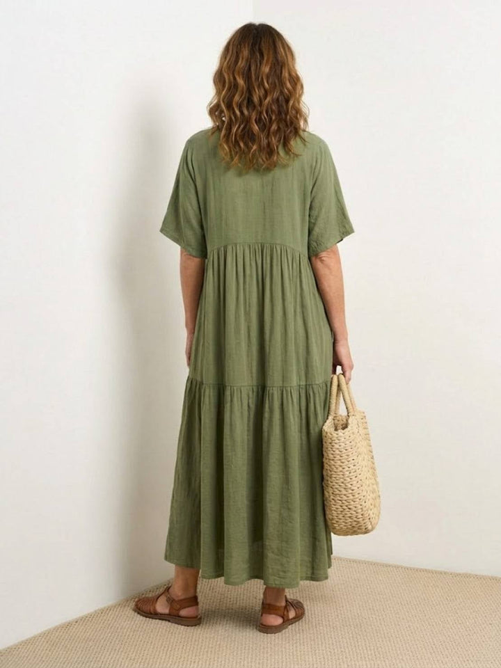 Full-length shot of Sienna maxi dress in apricot with relaxed short sleeves