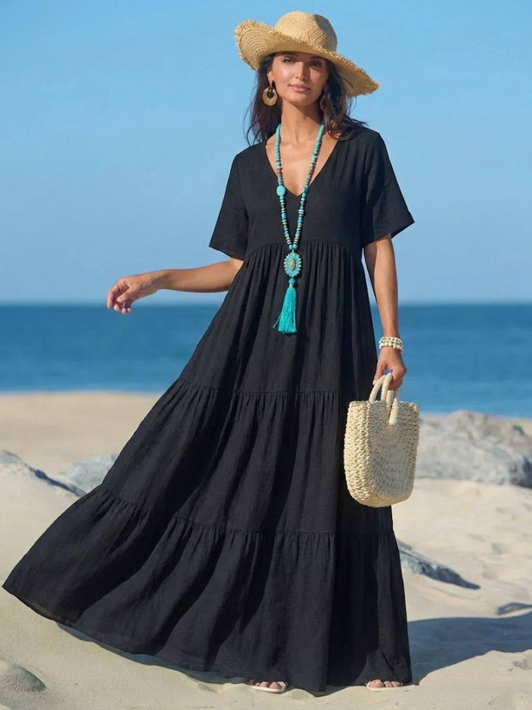 Front view of Sienna tiered maxi dress in navy blue with short sleeves