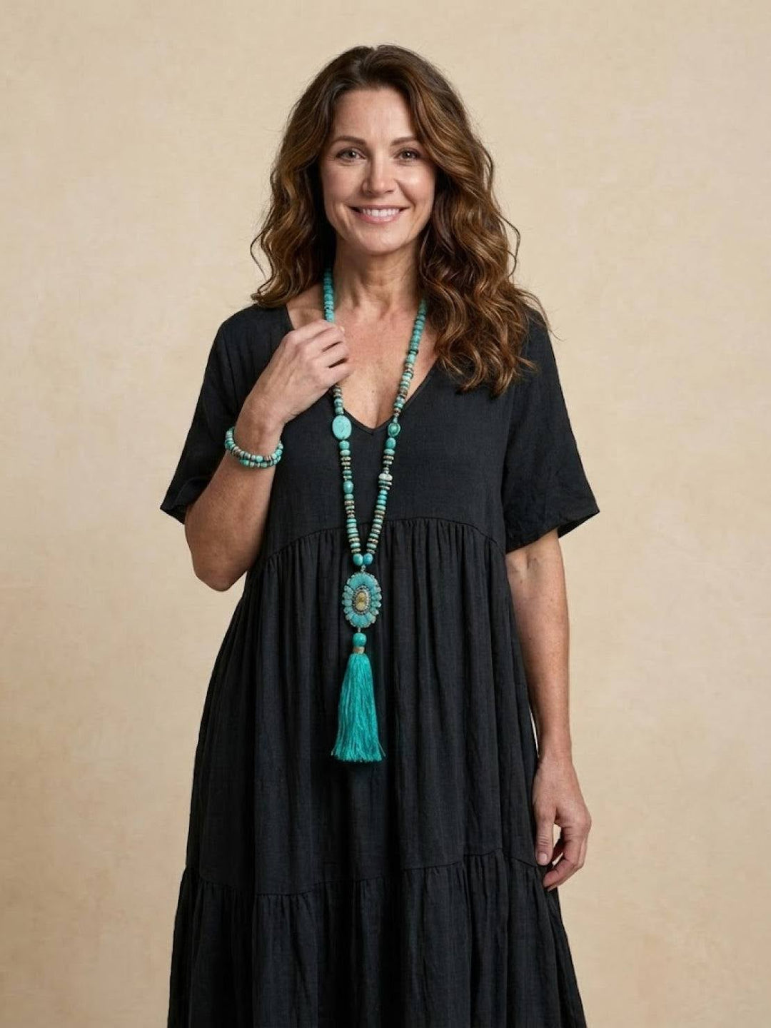 Side profile of Sienna tiered maxi dress in navy blue
