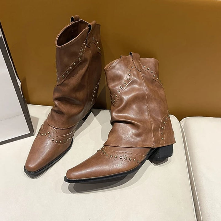 Close-up of Sierra western boot shaft showing stitching and stud placement
