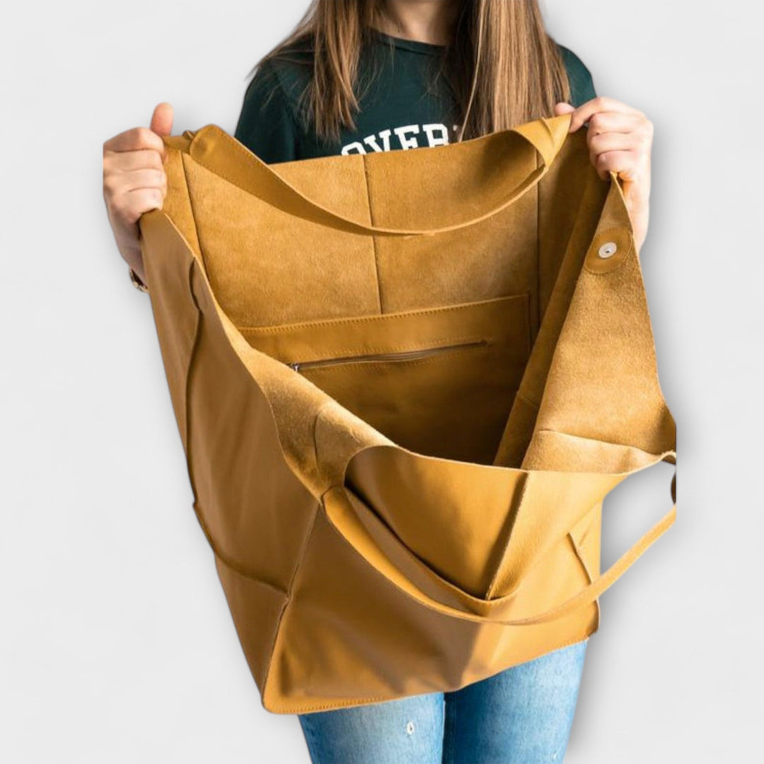 Side view of the Sigrid Everyday Bag showing depth and spacious structure