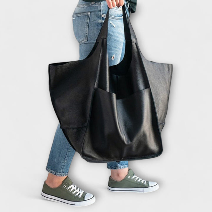 Sigrid Everyday Bag in green shown at an angle to display full profile