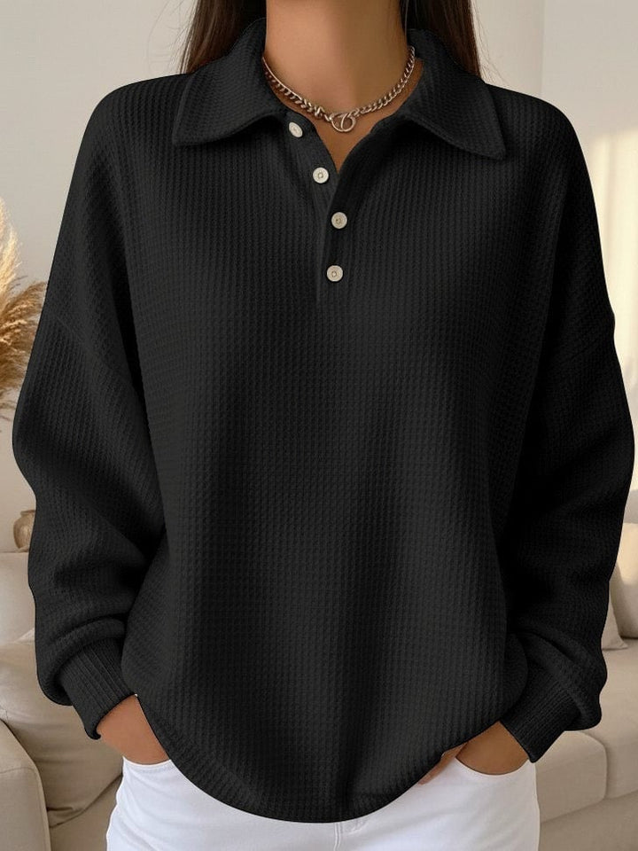 Full-length view of model wearing the Sky textured polo sweater in a relaxed everyday outfit