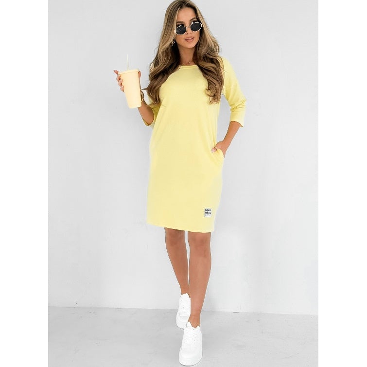 Front view of the Skye sweatshirt mini dress in blue showing round neckline and relaxed above-the-knee length
