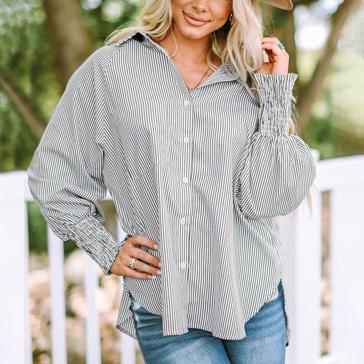Front view of the Skye striped oversized shirt showing classic collar and button placket detail