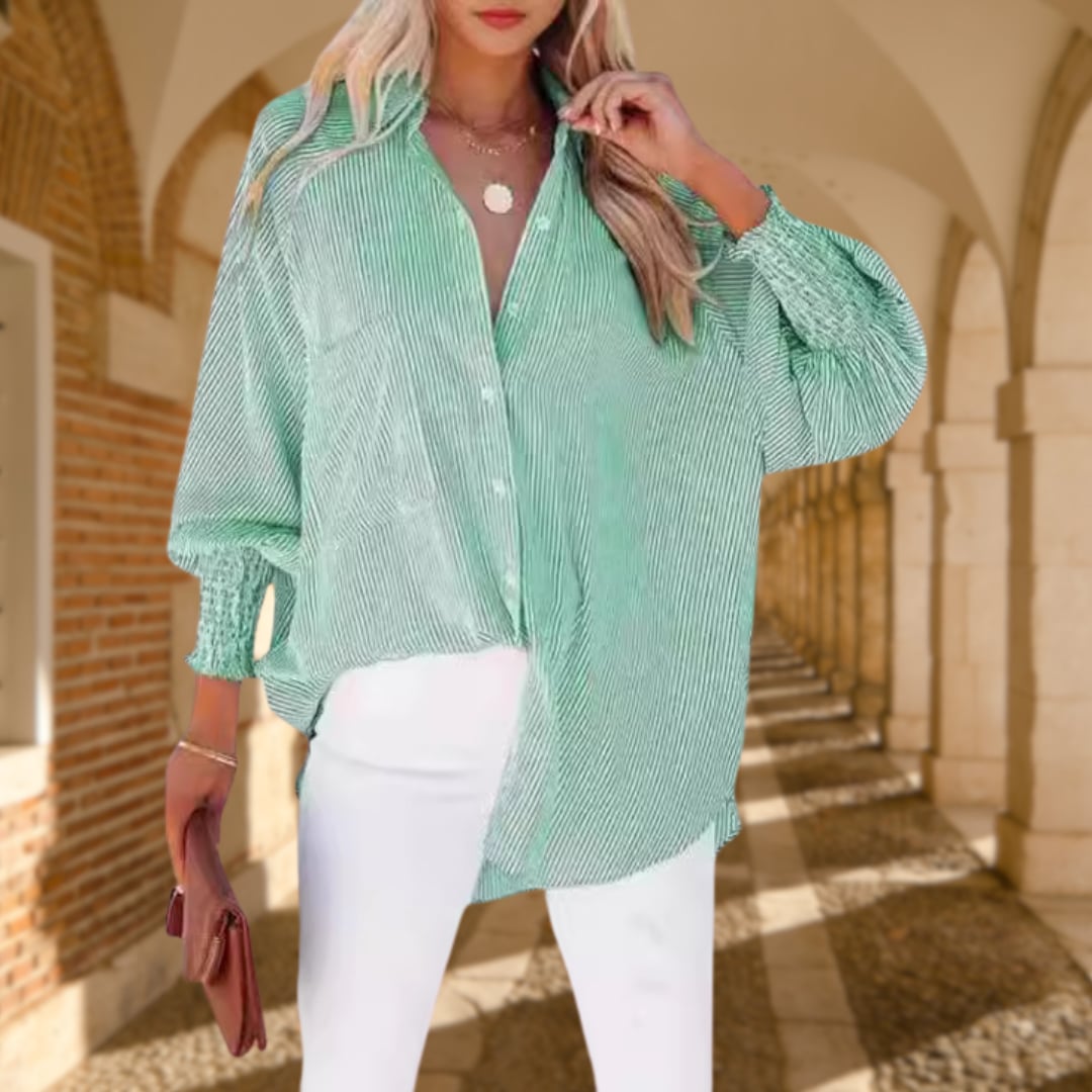 Flat lay of the Skye oversized button-down shirt in pink stripe colorway