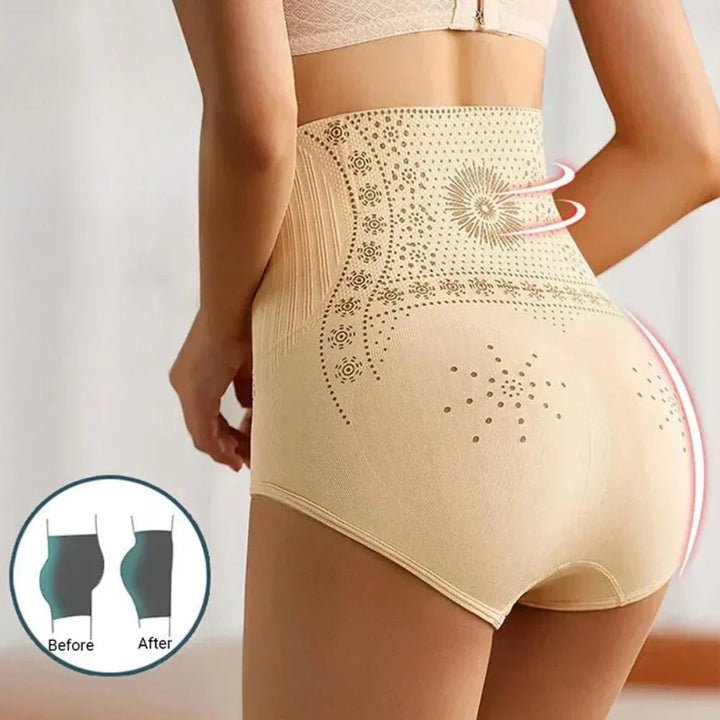 Flat lay of four slimming underwear colors: beige, black, pink, and grey