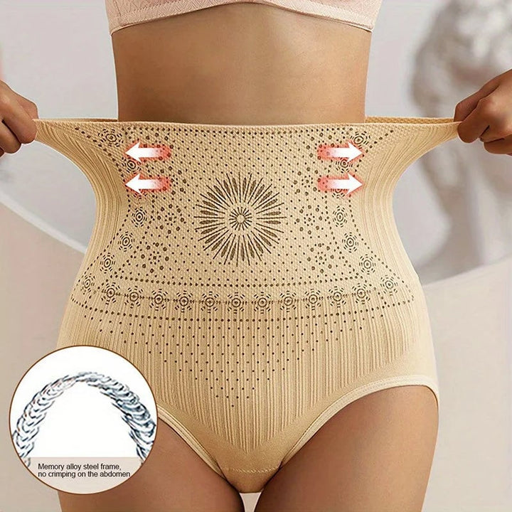 Model wearing fitted dress over slimming underwear with no visible lines