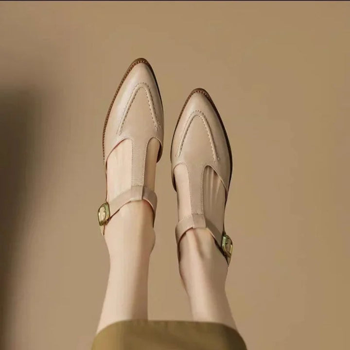 Sloane pointed toe flats in apricot styled with tailored trousers, lifestyle shot
