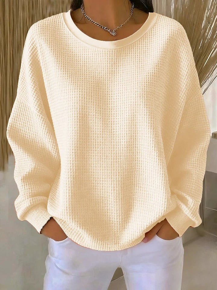 Back view of the Sofia textured knit sweater in grey showing the relaxed silhouette and shoulder fit