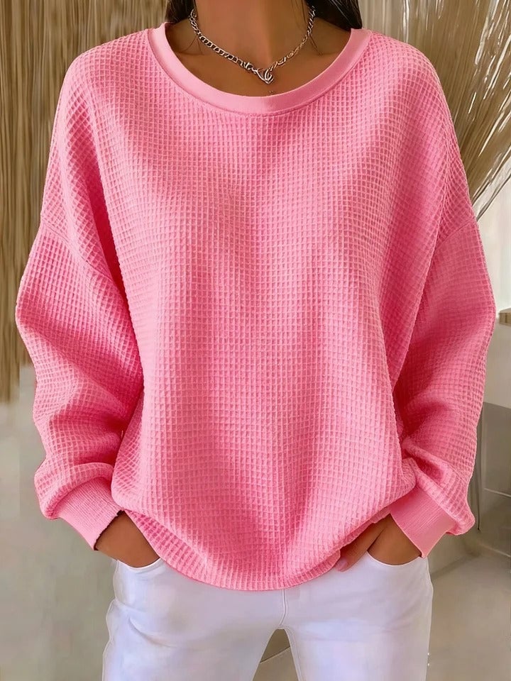 Studio shot of the Sofia textured knit sweater in multiple color options arranged side by side