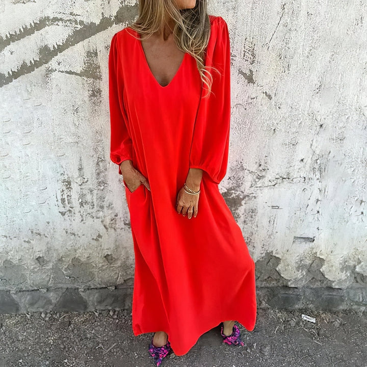 Flowing maxi dress shown in multiple colors including pink, black, green, and red