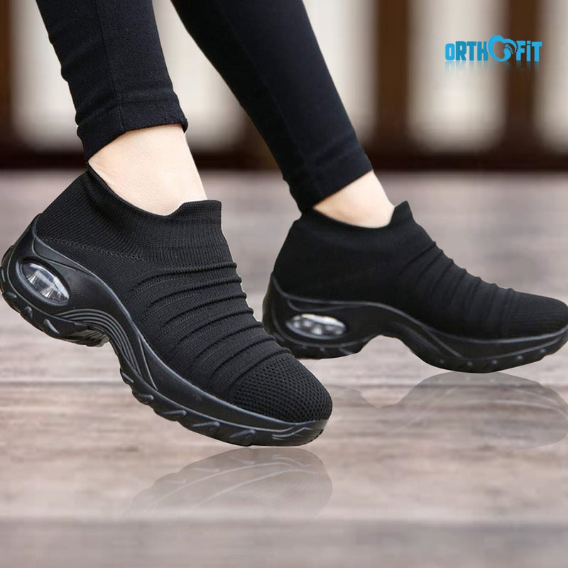 Solange women's arch support shoes in black with gray sole, side view on white background