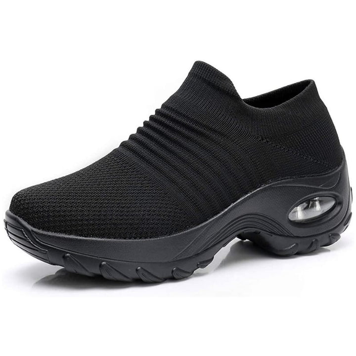 Solange women's arch support shoes in gray, angled front view showing minimalist silhouette