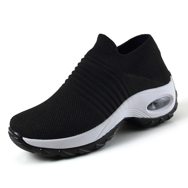 Solange women's arch support shoes in all-black colorway on white background