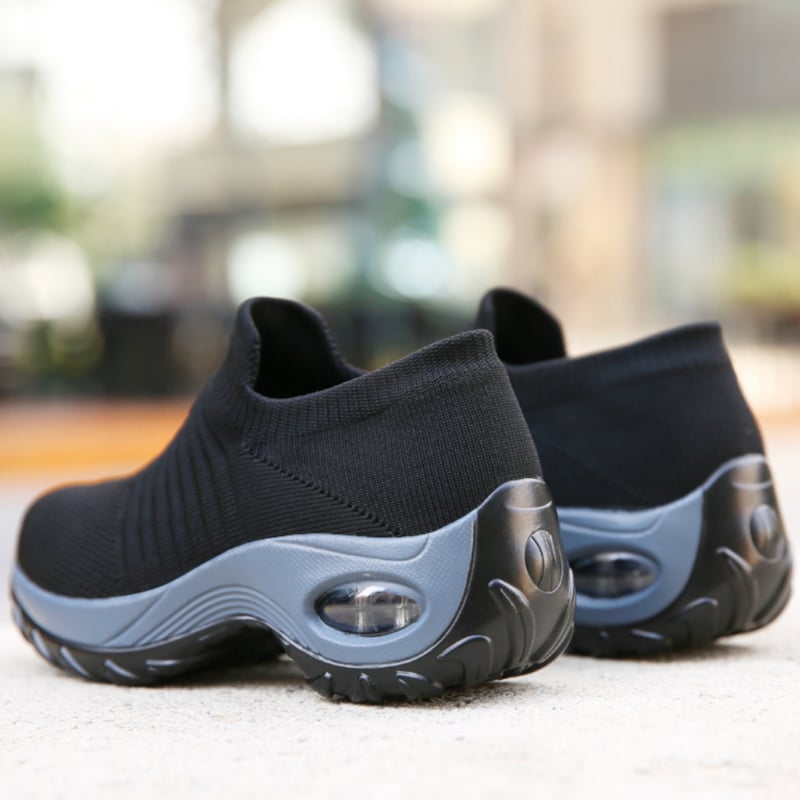 Solange black with colored stripes arch support shoes, close-up of stripe detail