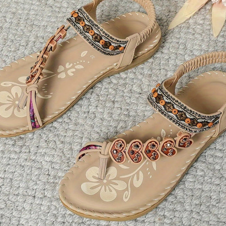 Solara sandals in brown colorway against a neutral background